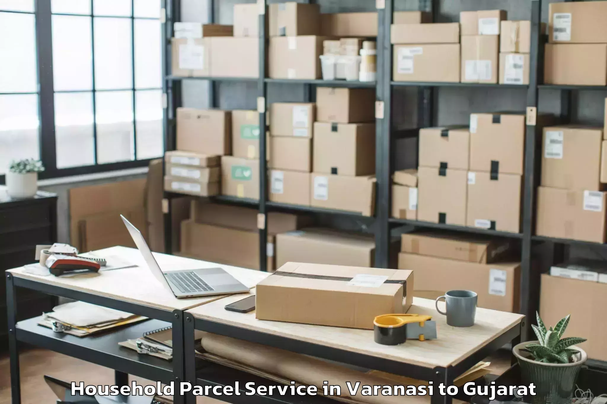 Get Varanasi to Hansot Household Parcel